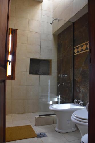 Ванная комната в Hotel Refugio Del Sol