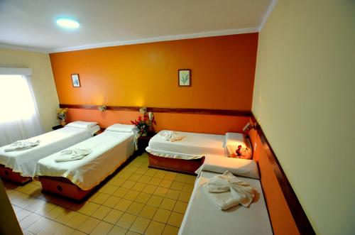 Katil atau katil-katil dalam bilik di Hostería Casa Blanca Iguazú
