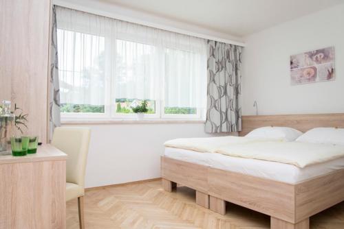Gasthaus zur Waldschenke tesisinde bir odada yatak veya yataklar