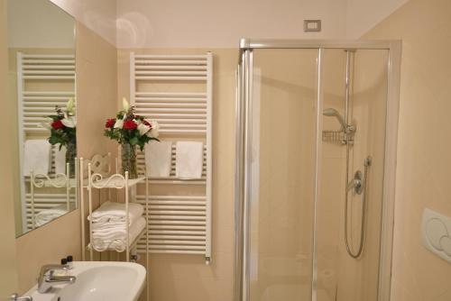 a bathroom with a shower and a sink at Residenza Fiorentina in Florence
