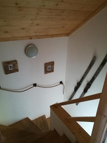 a room with some skis on the wall at Apartmany Bublava 817 in Bublava