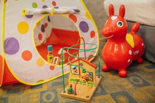 a toy toy of a toy rabbit and a toy house at Click Hotel - Taipei Main Station Branch in Taipei