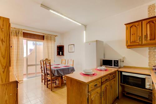 
A kitchen or kitchenette at T2 Cotta
