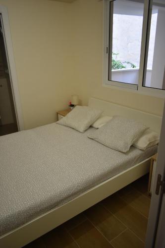 Tempat tidur dalam kamar di Alameda Centro Apartamento by TRG