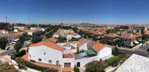 an aerial view of a city with houses at RSI Apartamentos in Merida