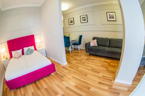 Katil atau katil-katil dalam bilik di Aparthotel Przy Plaży