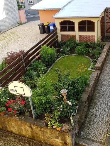 Un jardín fuera de Froeschlein - no craftsmen fitters