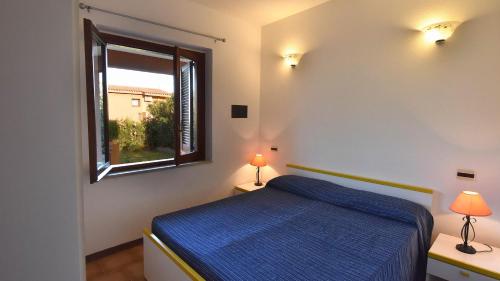 Cama o camas de una habitación en Residence Il Vascello