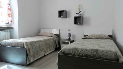 Llit o llits en una habitació de Feel at Home - CASA ALEXANDRA