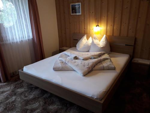 Postel nebo postele na pokoji v ubytování Nieslerhof