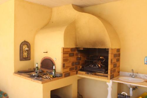 Virtuvė arba virtuvėlė apgyvendinimo įstaigoje Sud Vacances