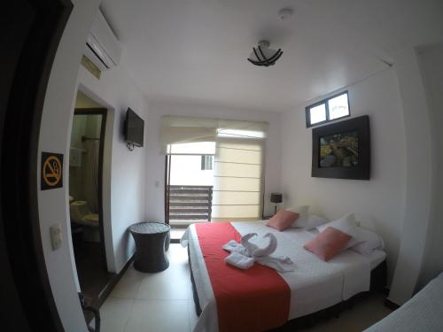 Katil atau katil-katil dalam bilik di Hostal Costa del Pacifico