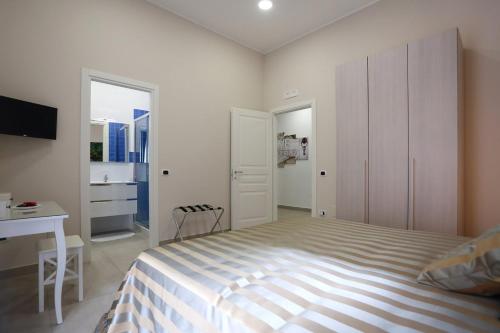 Katil atau katil-katil dalam bilik di B&B Rosolino