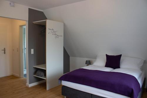 Postel nebo postele na pokoji v ubytování Heideträume Appartements