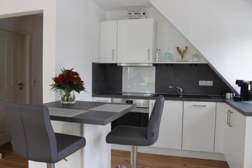 Kuchyň nebo kuchyňský kout v ubytování Heideträume Appartements