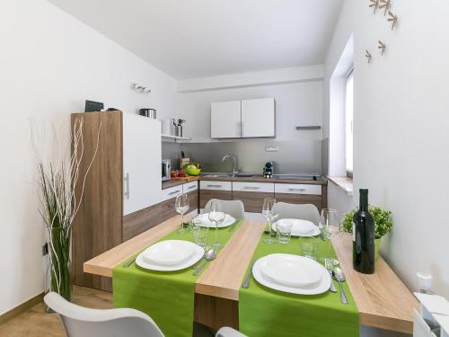 Kuchyň nebo kuchyňský kout v ubytování Pool Premium Apartment