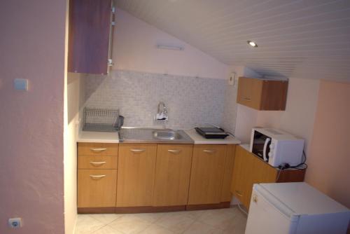 A kitchen or kitchenette at Exotic Guest House