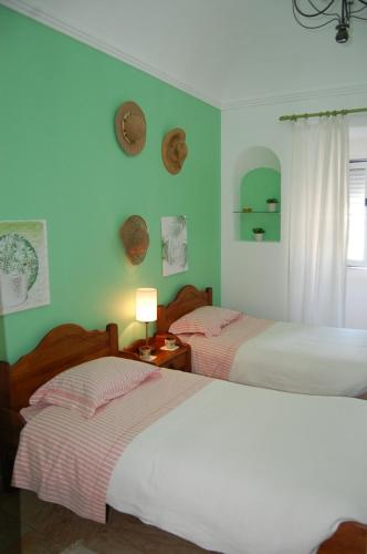 מיטה או מיטות בחדר ב-Arraiolos VILLA
