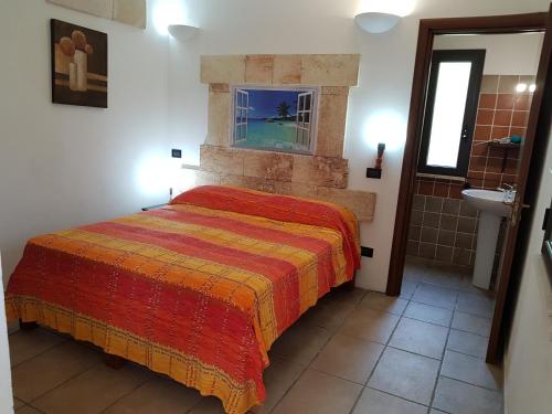 Posteľ alebo postele v izbe v ubytovaní Masseria Pesco
