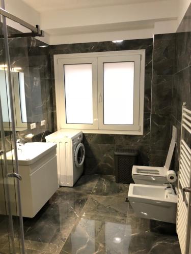 Koupelna v ubytování Brilant Apartament