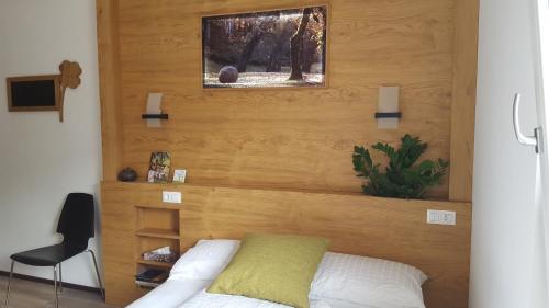 Postel nebo postele na pokoji v ubytování Masetto Egidio Eco-Agritur