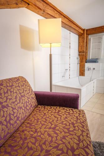 Кровать или кровати в номере AKZENT Hotel Sternen