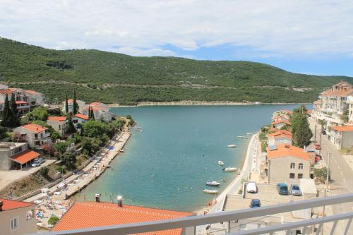 a view of a town with boats in the water at Villa Hortus in Neum