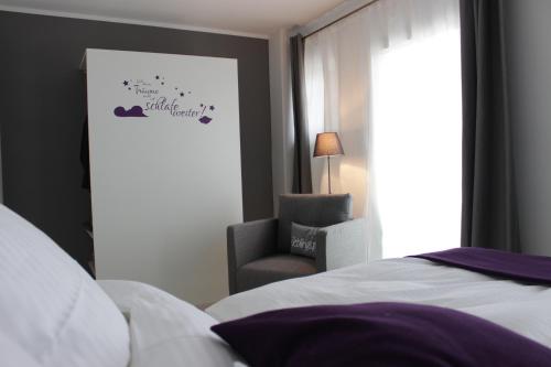 Postel nebo postele na pokoji v ubytování Heideträume Appartements