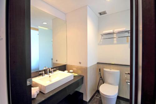 Ванная комната в Hotel Santika Siligita Nusa Dua