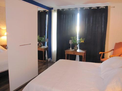Postel nebo postele na pokoji v ubytování APPARTEMENT DUPLEX 71 m2 - 4 personnes