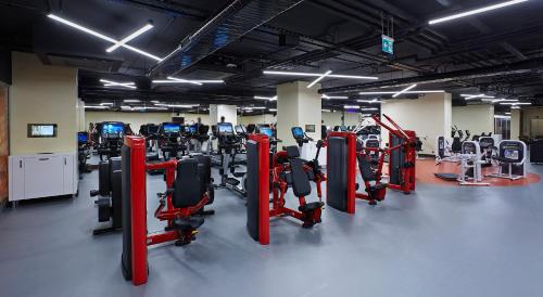 a gym with a bunch of equipment in a room at Uranus Istanbul Topkapi in Istanbul