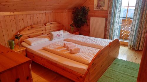 Katil atau katil-katil dalam bilik di Almchalet Orter