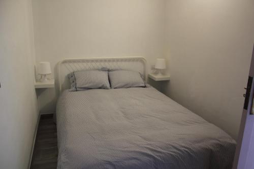 Ένα ή περισσότερα κρεβάτια σε δωμάτιο στο Apart. 3