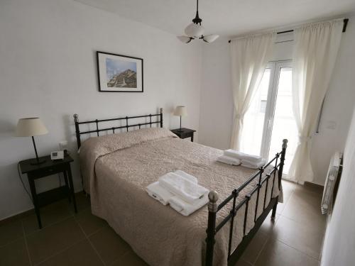 En eller flere senger på et rom på Apartamento Maraka Playa Castelldefels