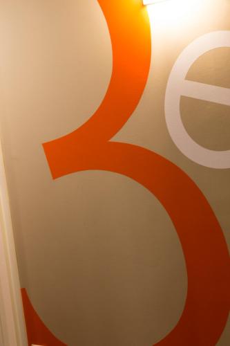 a close up of a sign on a wall at Hôtel de Brienne in Toulouse