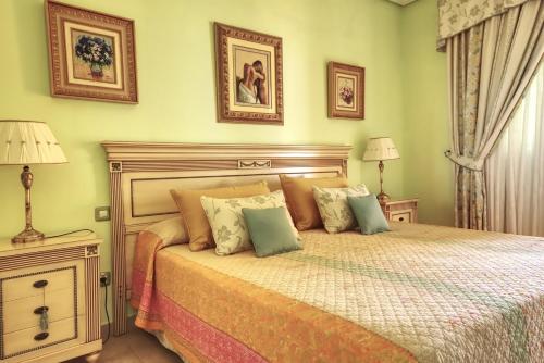 Ein Bett oder Betten in einem Zimmer der Unterkunft Hotel La Colina
