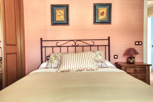 Кровать или кровати в номере Hotel La Colina