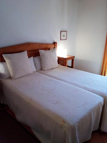 Ένα ή περισσότερα κρεβάτια σε δωμάτιο στο Hotel Apartament Sa Tanqueta De Fornalutx - Adults Only