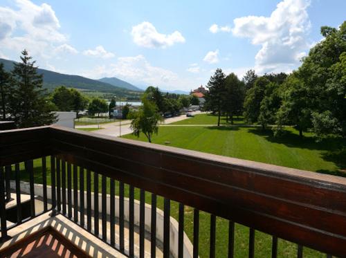 a balcony with a view of a park at Pravets Spa Resort Apartments in Pravets