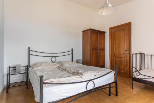 Ένα ή περισσότερα κρεβάτια σε δωμάτιο στο Casa Bea Bosa/Magomadas
