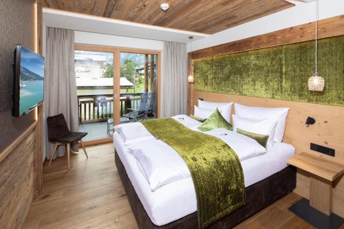 Postel nebo postele na pokoji v ubytování Wagner's Aparthotel