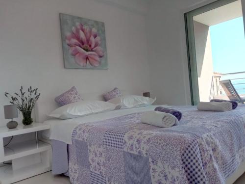 Ένα ή περισσότερα κρεβάτια σε δωμάτιο στο Villa Filip
