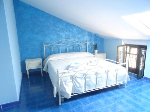 Postel nebo postele na pokoji v ubytování B&B Alòs