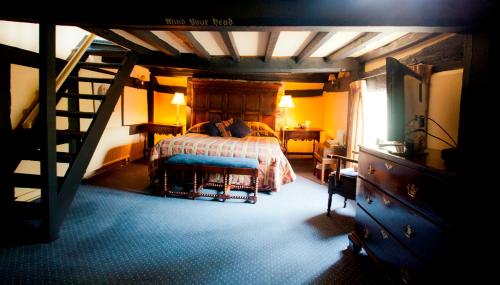 Ένα ή περισσότερα κρεβάτια σε δωμάτιο στο The Old Black Lion