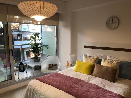 Katil atau katil-katil dalam bilik di Impecable monoambiente en Belgrano