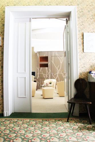 Χώρος καθιστικού στο Hostellerie au Cygne