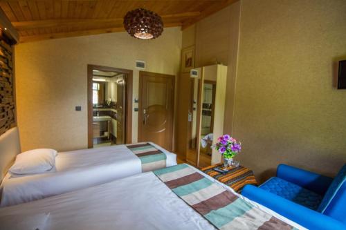 Ayderoom Hotelにあるベッド