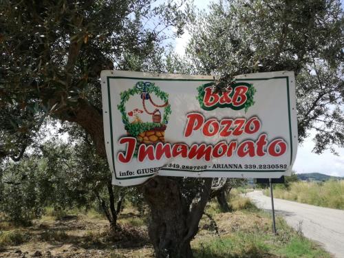 a sign for a pueblo timpanogos restaurant at B&B Pozzo Innamorato in Montenero di Bisaccia