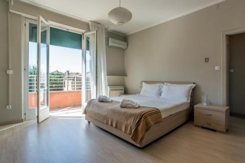 Posteľ alebo postele v izbe v ubytovaní Ca Silvia Lido di Venezia