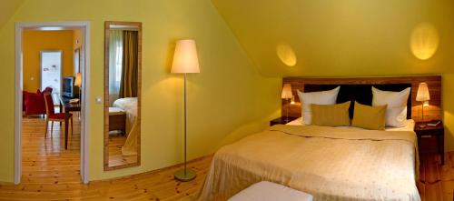 Letto o letti in una camera di Hotel Habichtstein